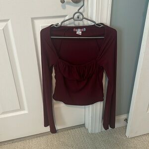 Urban outfitters blouse with frilled area in the chest.